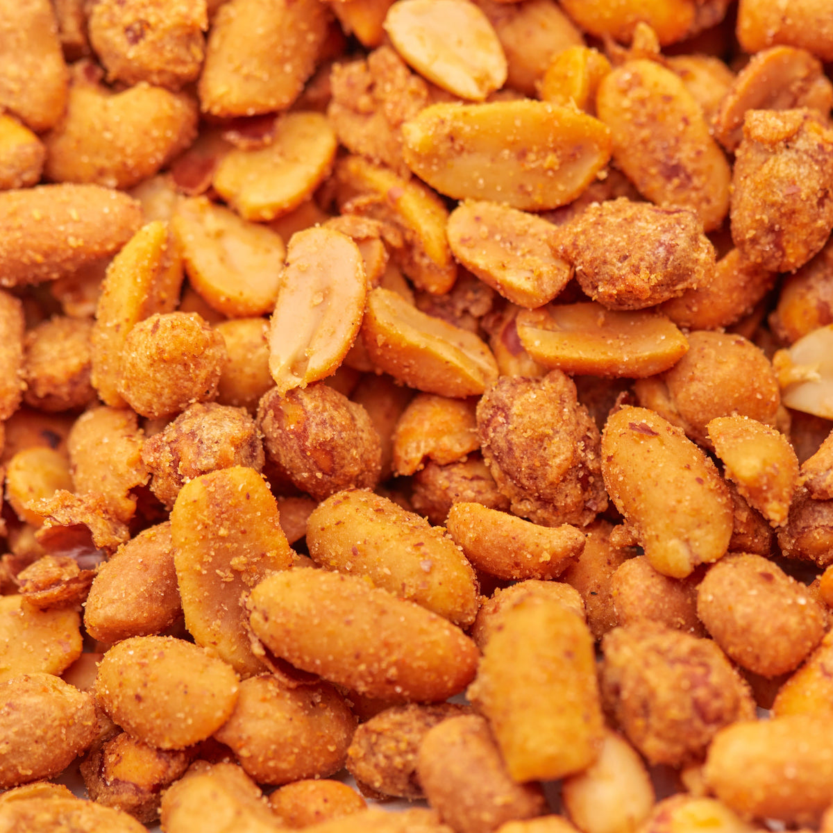 Chili-gewürzte Erdnüsse und Cashewkerne im herzhaften Nussmix Spicy Chili von NESSLIM.