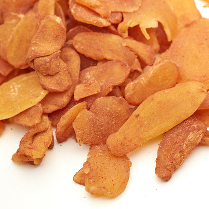 Kandierte Ingwerscheiben mit Zimt von NESSLIM zum Verfeinern von Heißgetränken, Gebäck und weihnachtlichen Rezepten.
