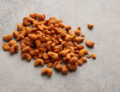 Geöffnete NESSLIM Packung mit Cashewkernen BBQ Style